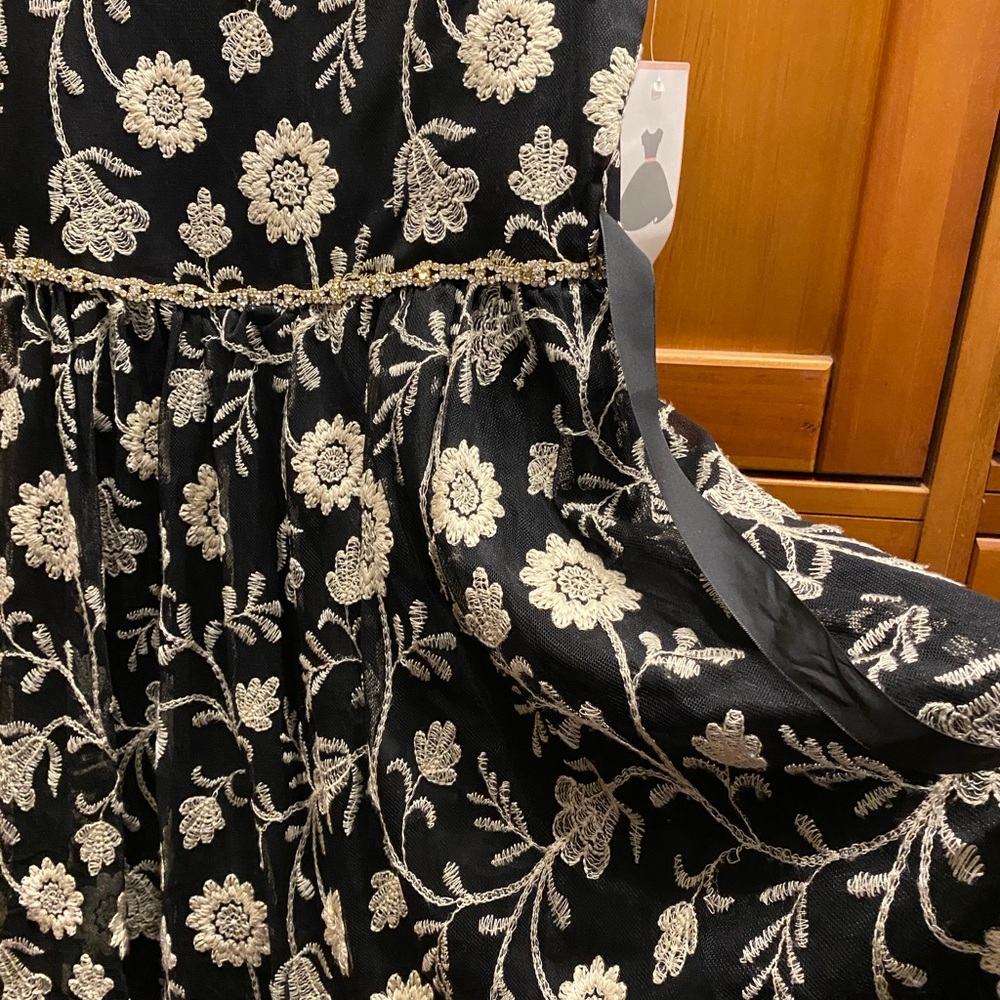 Girls party dress by Rare Editions